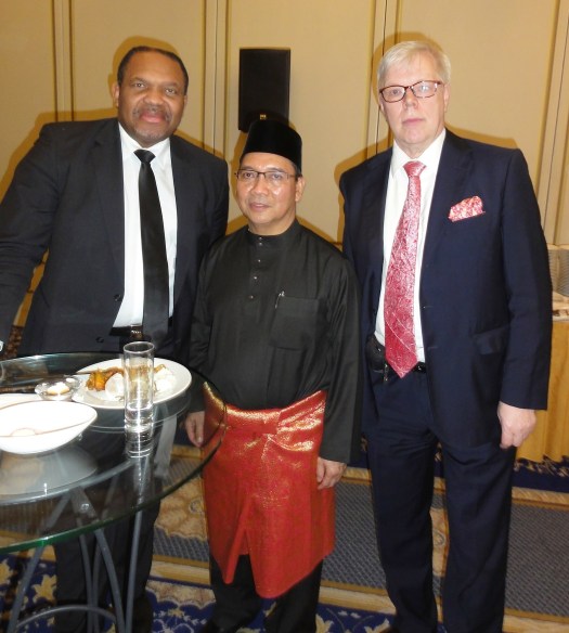 Bertin Mampaka, brussels regional member of Parliament (left) and Björn HULTIN, consultant european affairs surrounding H.E. the Ambassador of Brunei